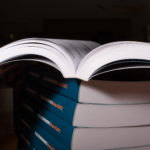 stacked manuals with Perfect Binding