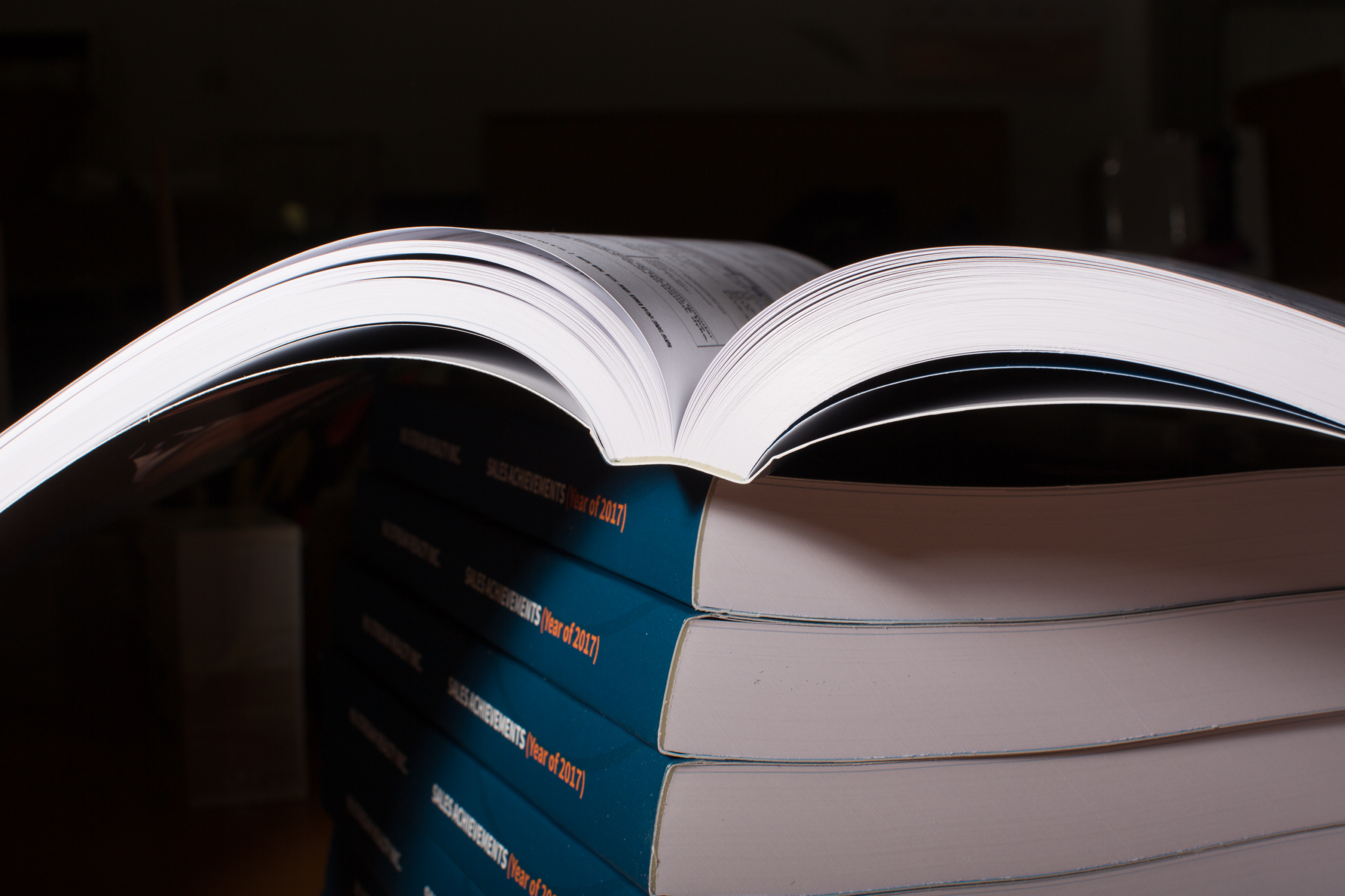 stacked manuals with Perfect Binding