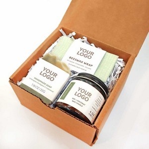Gift box set with branded jars and product labels.
