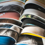Many opened journals with perfect binding. Sun light.