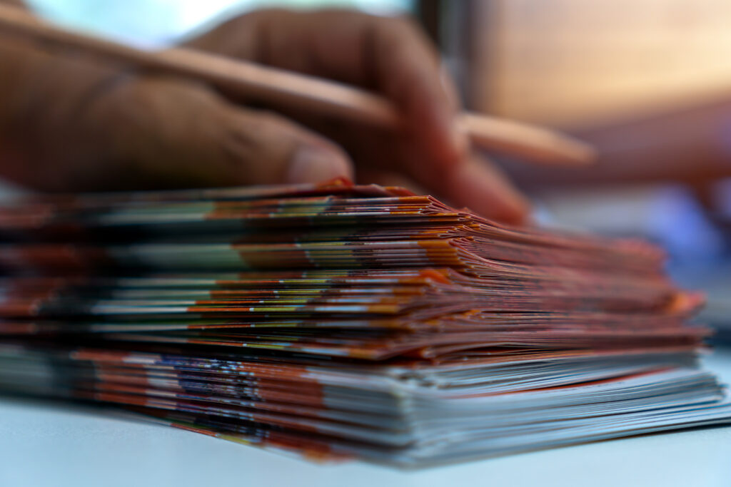 Business Documents concept : Businessman hands working in Stacks